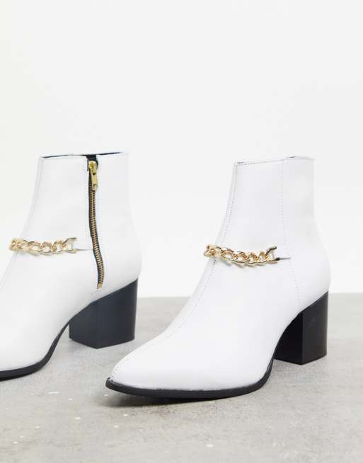 ASOS DESIGN Bottines Chelsea talon en cuir avec bout pointu et semelle blanche Blanc