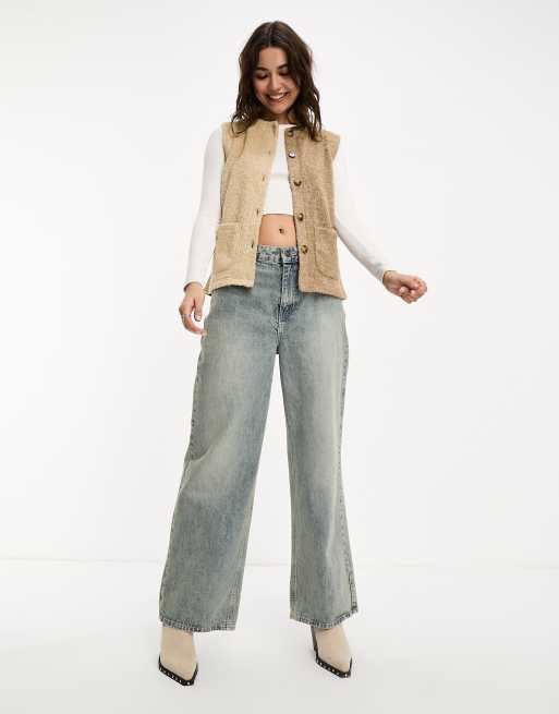 ASOS DESIGN boucle knit spliced vest in ecru and taupe