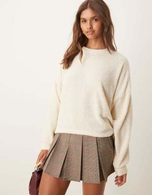 boucle knit sweater in cream-White