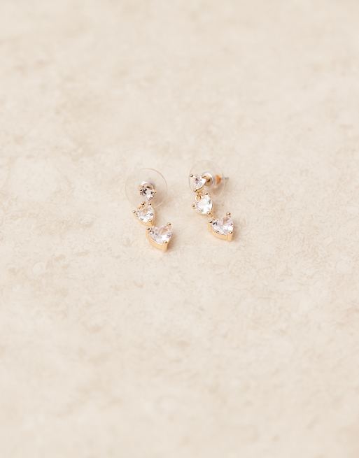 ASOS DESIGN - Boucles d'oreilles avec cœurs ornés de zircons cubiques - Doré
