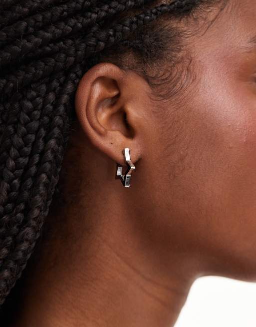 ASOS DESIGN - Boucles d'oreilles étoiles en acier inoxydable étanche - Argenté
