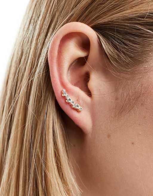 Boucle d'oreille grimpante : l'accessoire tendance