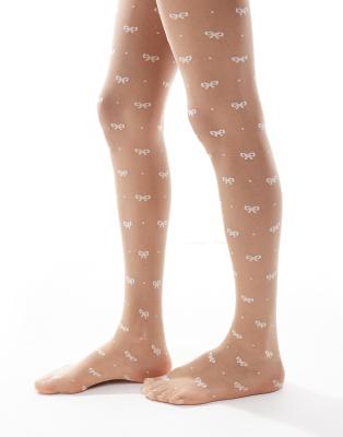 bow and dot tights in white