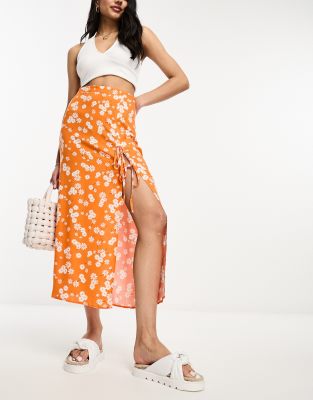 Asos Design Bow Detail Midi Skirt With Thigh Slit In Orange Ditsy Floral