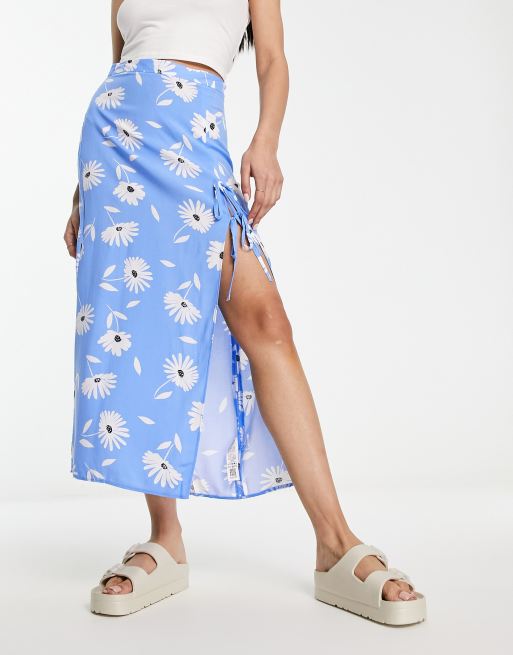 ASOS DESIGN bow detail midi skirt with thigh split in blue daisy print