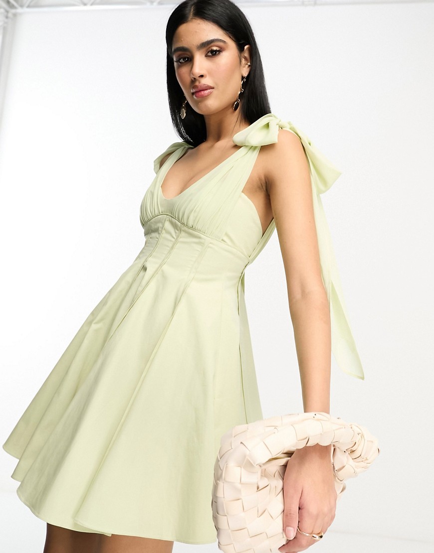 Bow shoulder mini dress with pleat waist