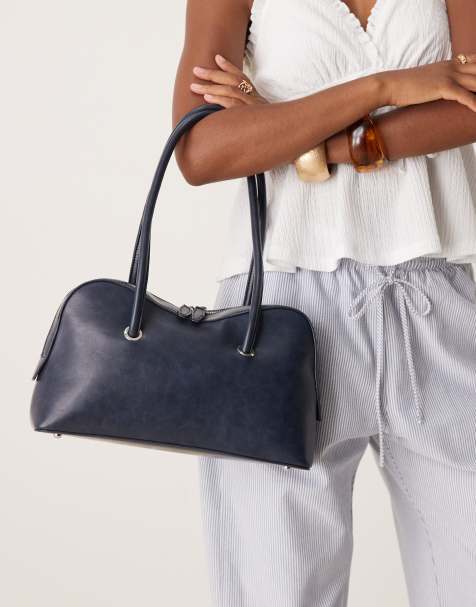 ASOS DESIGN bowler bag with curve detail in washed navy - view 1