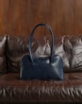 [ASOS DESIGN] ASOS DESIGN bowler bag with curve detail in washed navy No Size NAVY
