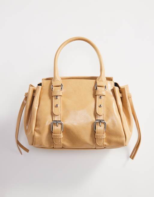 ASOS DESIGN bowler bag with double buckle in buttermilk yellow