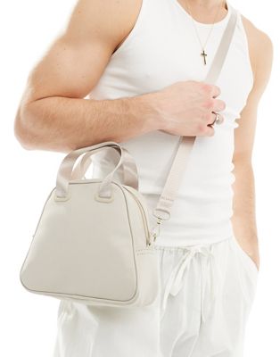 bowler cross body bag with grab handle and detachable strap in rubberised ecru-White