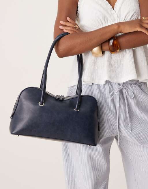 ASOS DESIGN – Bowlertasche in verwaschenem Marineblau mit abgerundetem Design