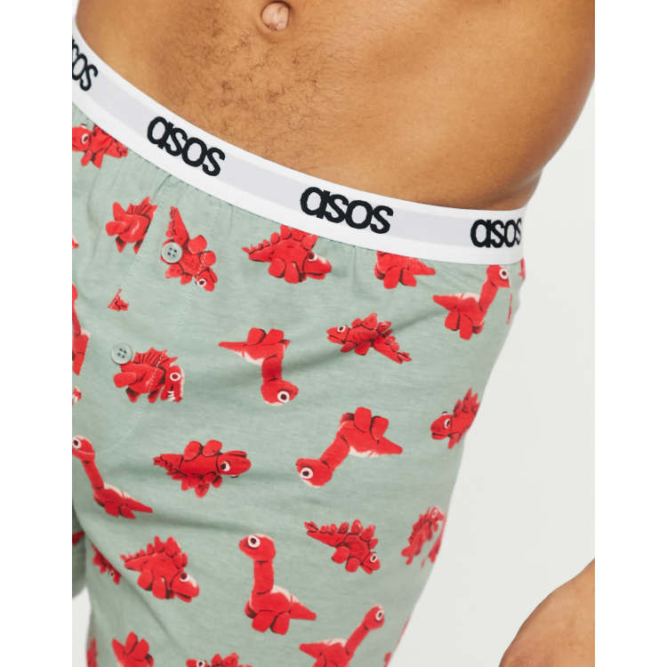 ASOS DESIGN Christmas boxers with dinosaur print