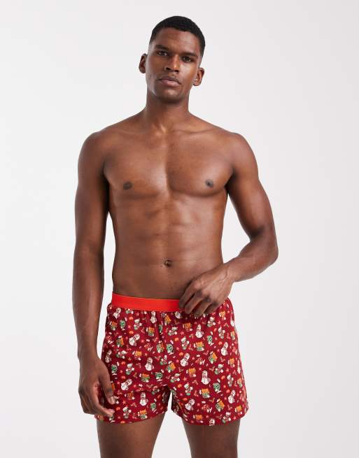 ASOS DESIGN boxer with retro Christmas graphic in red