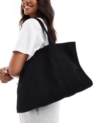 ASOS DESIGN boxy canvas laptop tote bag in black