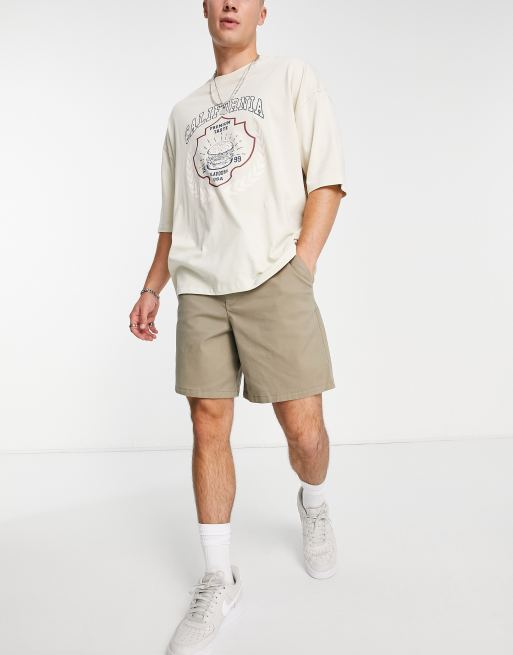 ASOS DESIGN pleated chino shorts in mid length in khaki