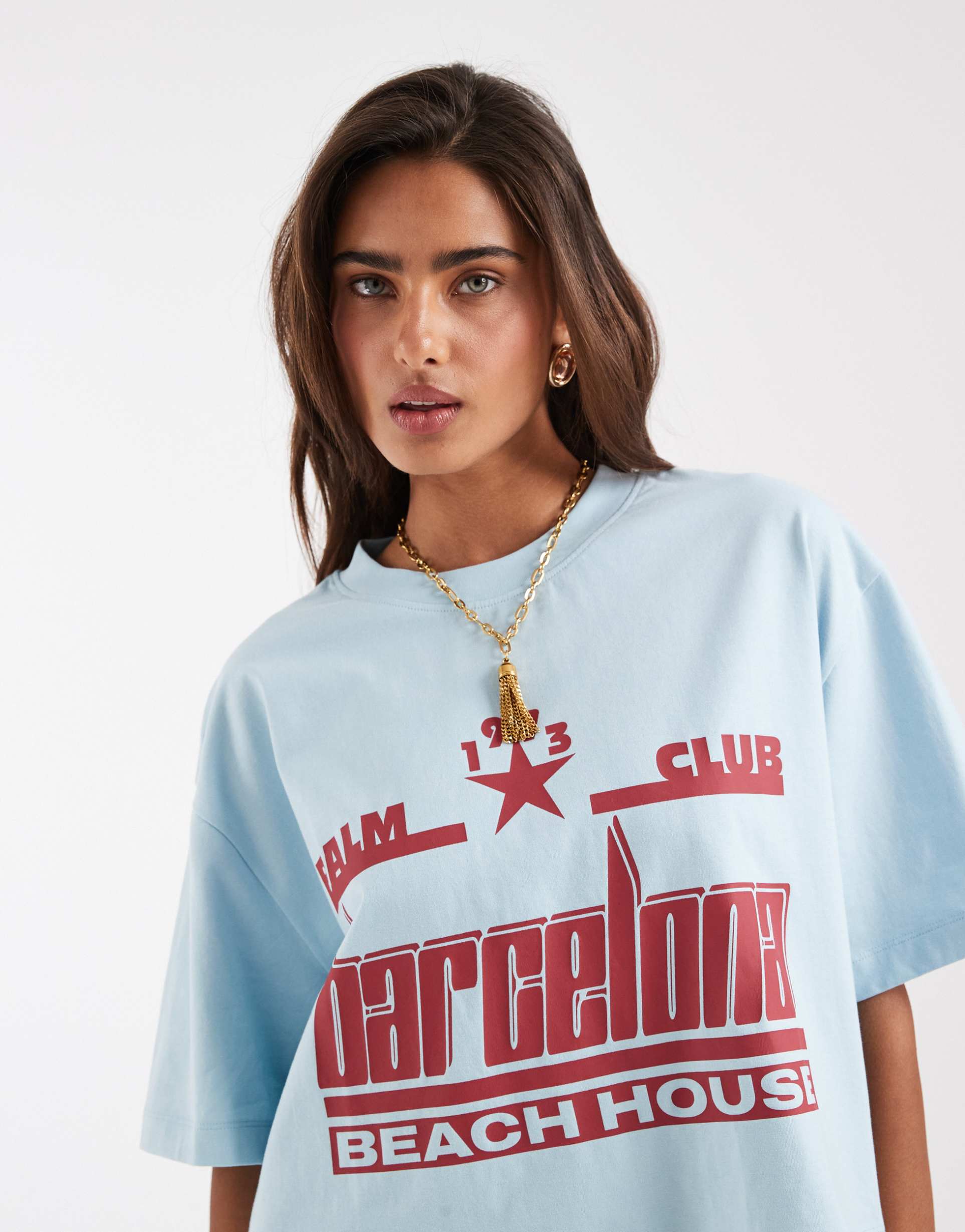asos design boxy crop t-shirt with barcelona graphic in baby blue
