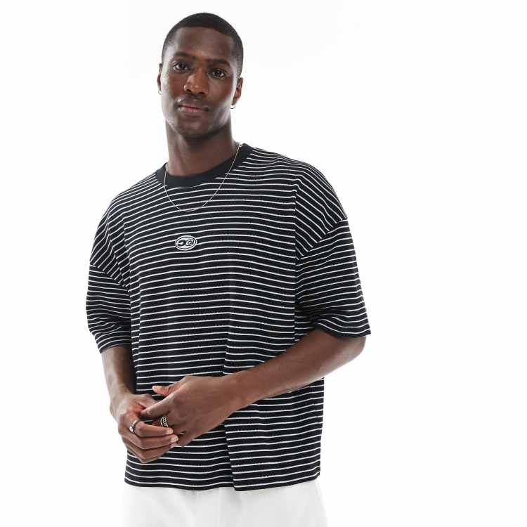 ASOS DESIGN boxy dropped shoulder striped T-shirt in black
