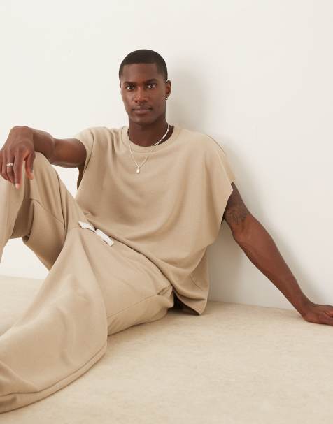 ASOS DESIGN boxy extreme oversized sleeveless sweatshirt in beige - view 1