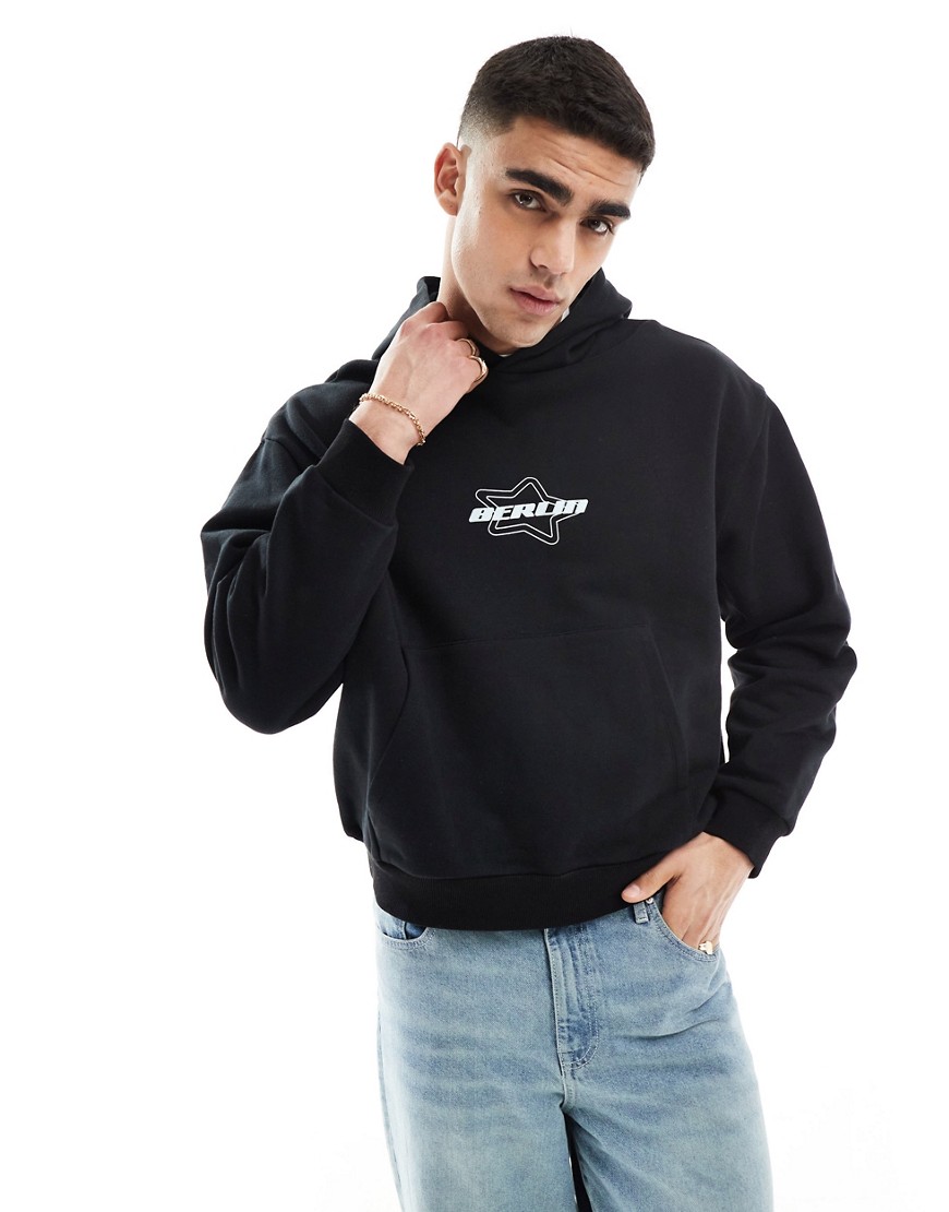 ASOS DESIGN boxy fit hoodie in black with Berlin print