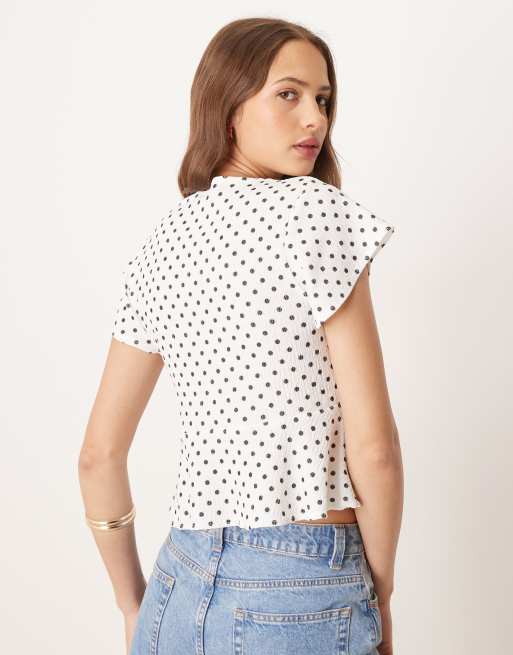ASOS DESIGN boxy fit ruffle detail top in cream polka dot