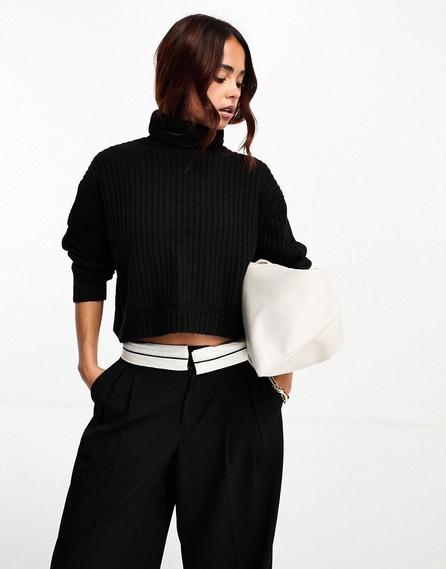 ASOS DESIGN boxy jumper in rib with roll neck in black