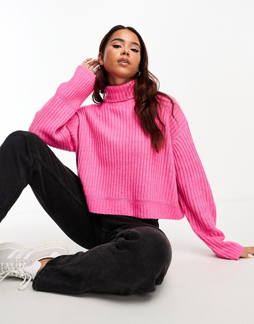 ASOS DESIGN boxy jumper in rib with roll neck in pink