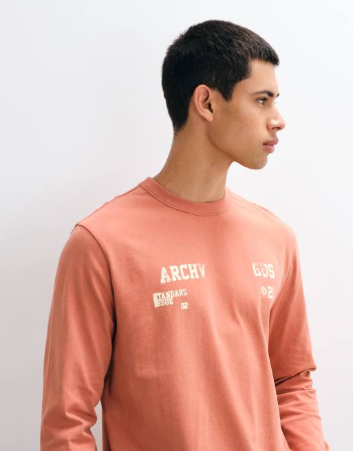 ASOS DESIGN boxy langærmet T-shirt med tekst i vasket pink, 3 af 5