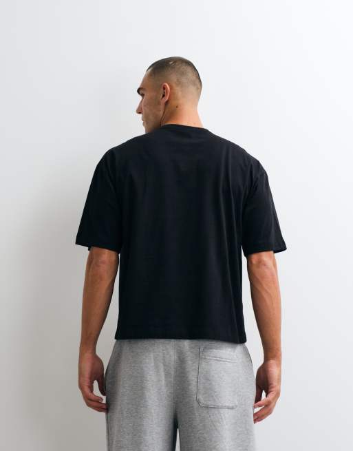 ASOS DESIGN boxy oversize t-shirt henley z nadrukiem tekstowym w czerni, 4 z 5