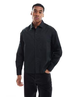 ASOS DESIGN boxy oversized button poplin shirt in black φωτογραφία