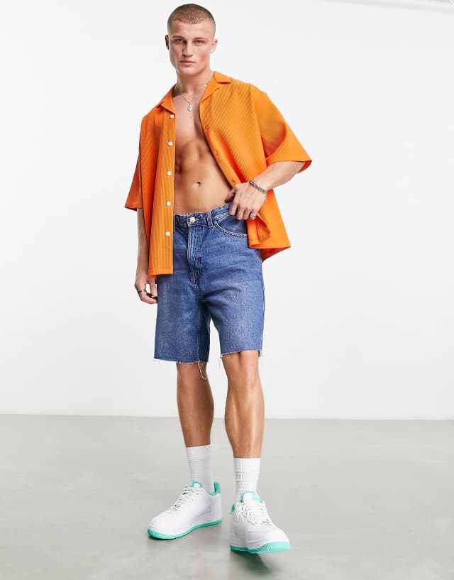 ASOS DESIGN boxy oversized camp collar shirt in chunky stretch rib in orange