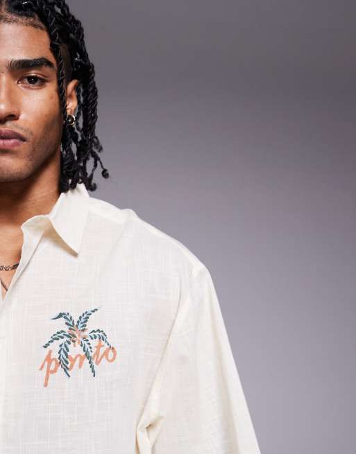 ASOS DESIGN boxy oversized camp collar shirt with chest print in stone