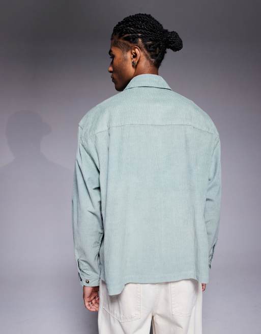 ASOS DESIGN boxy oversized corduroy shirt with badge detail in green