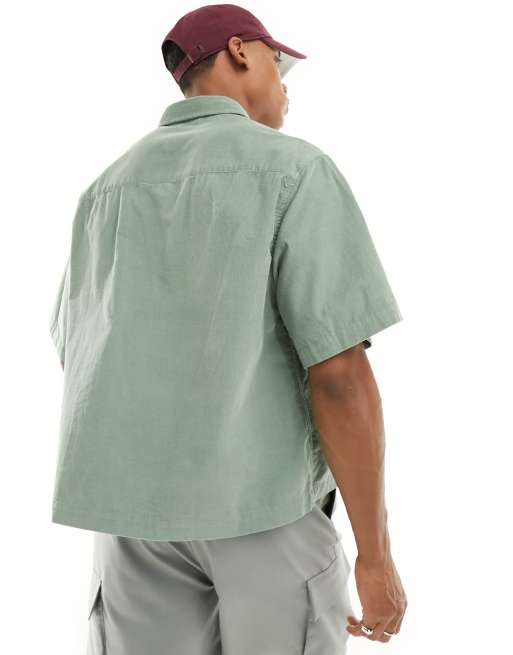 ASOS DESIGN boxy oversized cropped shirt in cord in light green