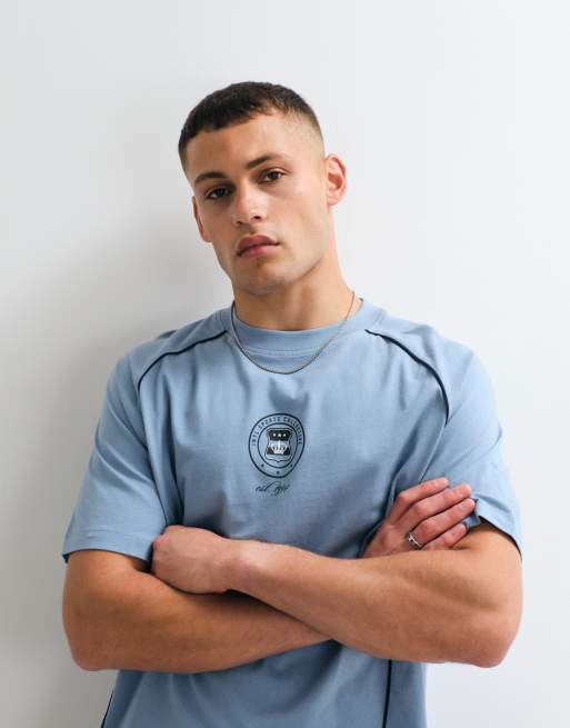 ASOS DESIGN boxy oversized cut and sew t-shirt with sports graphic in blue, 4 of 5