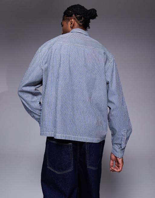 ASOS DESIGN boxy oversized denim shirt with badge in navy stripe