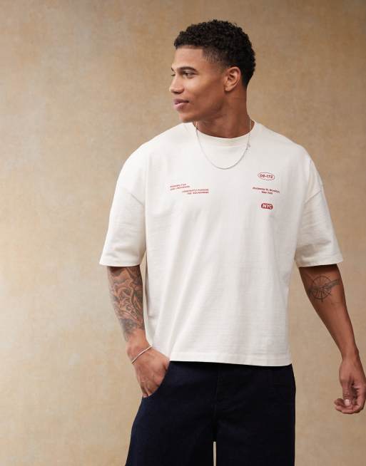 Camiseta color crema de corte cuadrado extragrande con hombros caídos y estampado trasero de ASOS DESIGN