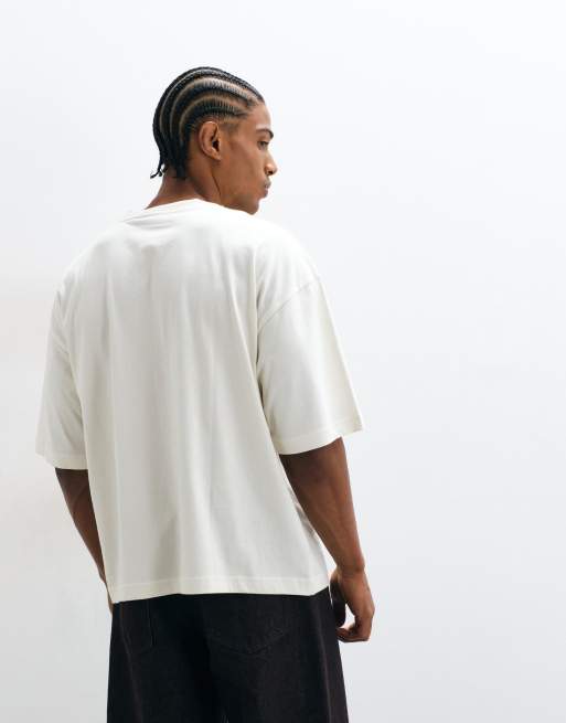 ASOS DESIGN boxy oversized henley t-shirt with text chest graphic in white, 4 of 5
