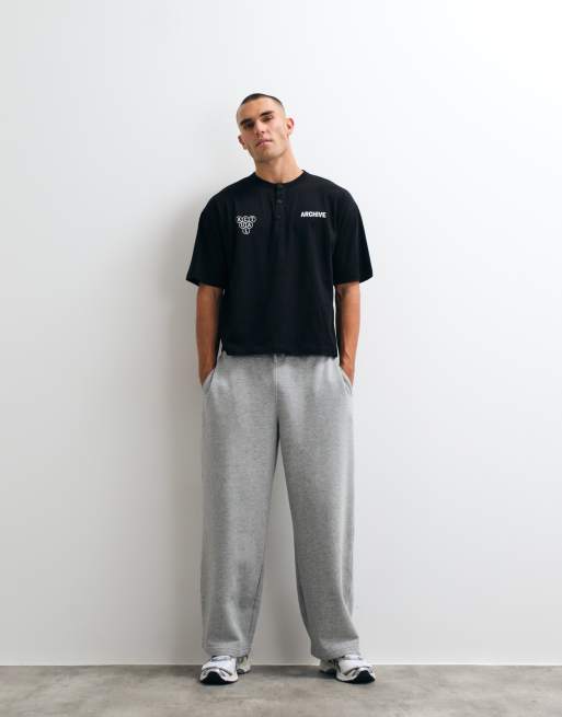 ASOS DESIGN boxy oversized henley t-shirt with text graphic in black, 2 of 5