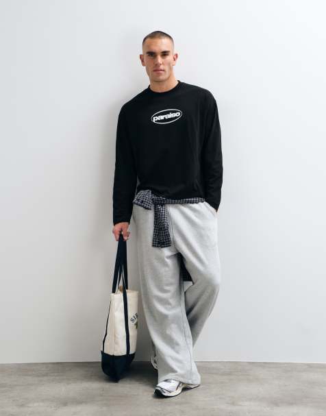 ASOS DESIGN boxy oversized langærmet T-shirt med brystgrafik i sort - view 1