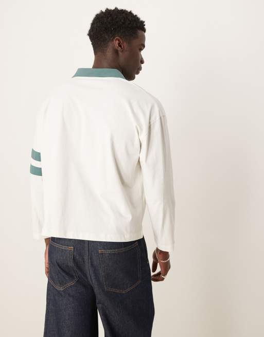 ASOS DESIGN boxy oversized long sleeve polo with dropped shoulder and football graphics in cream, 4 of 4