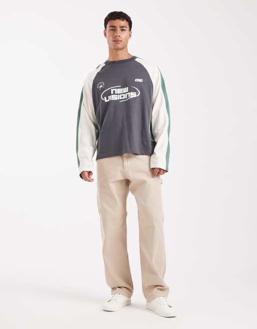 ASOS DESIGN boxy oversized long sleeve t-shirt with cut and sew panelling and sports graphics in dark grey