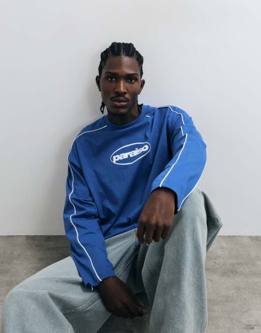 ASOS DESIGN boxy oversized long sleeve t-shirt with paraiso graphic in blue, 2 of 5