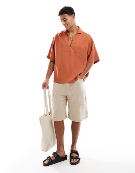 ASOS DESIGN boxy oversized overhead shirt with raw edge in rust - view 1