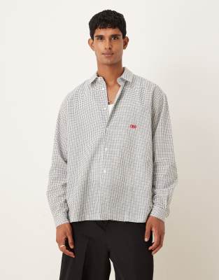 ASOS DESIGN boxy oversized plaid shirt with chest embroidery in black