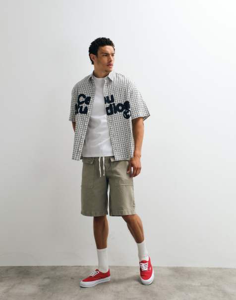 ASOS DESIGN boxy oversized plaid shirt with chest print in black and white - view 1