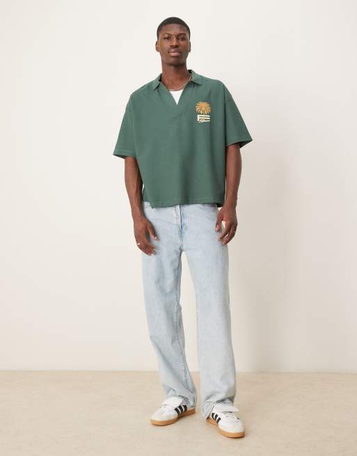 ASOS DESIGN boxy oversized polo in heavyweight waffle texture 230gsm with palm graphics in green