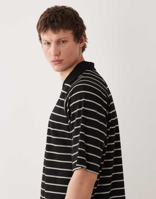 ASOS DESIGN boxy oversized polo shirt in black stripes , 4 of 5