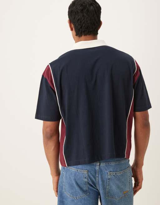 ASOS DESIGN boxy oversized polo shirt with chest print in navy
