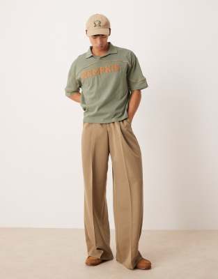 Asos Design Boxy Oversized Polo Shirt With City Print In Green