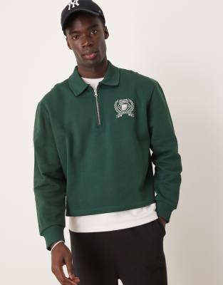 boxy oversized polo shirt with tipping and embroidered chest print in green